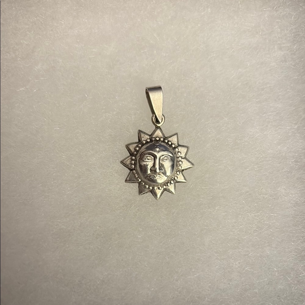 Vintage Sterling silver sun charm pendant marked 925